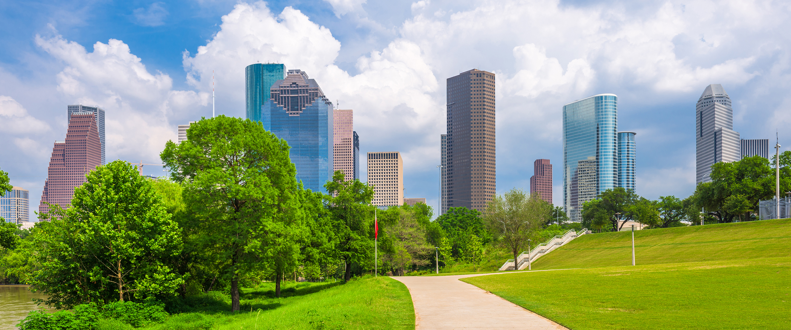 Houston, Texas, USA downtown city skyline and park in the afternoon